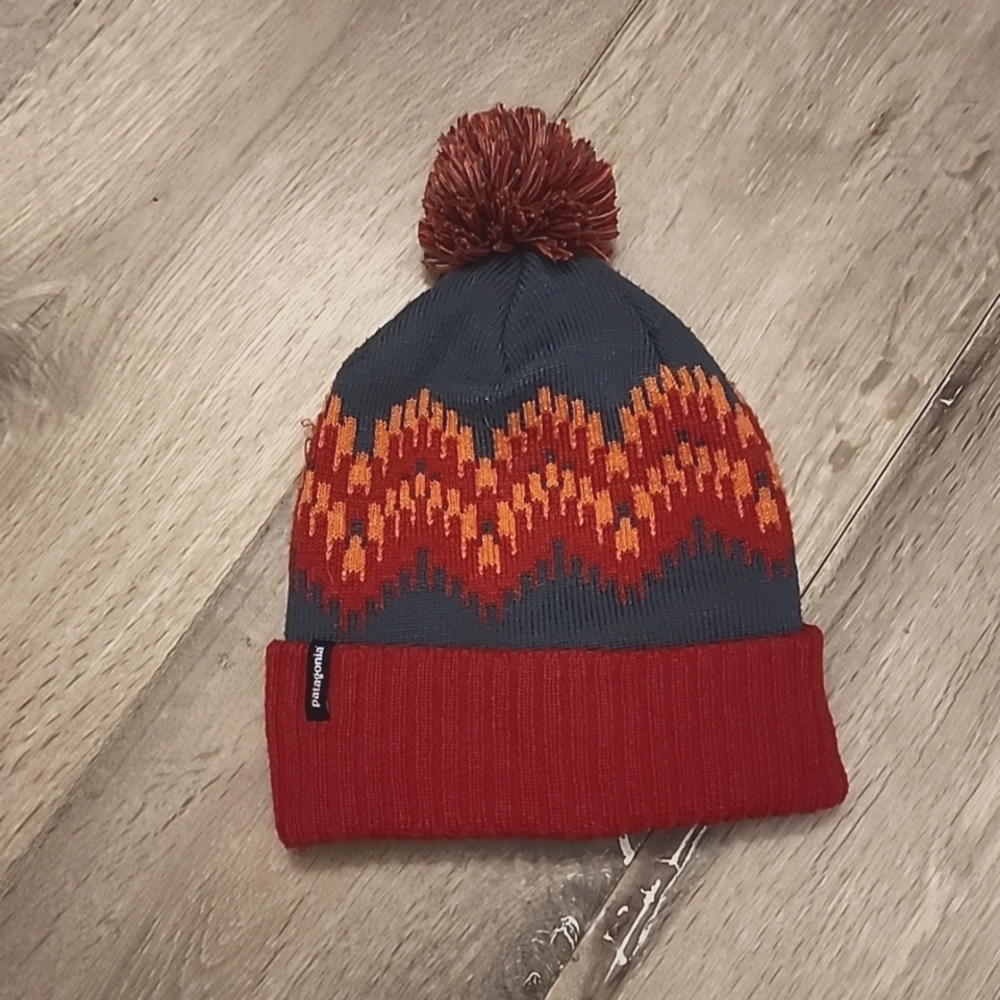 Patagonia red pom pom beanie hat